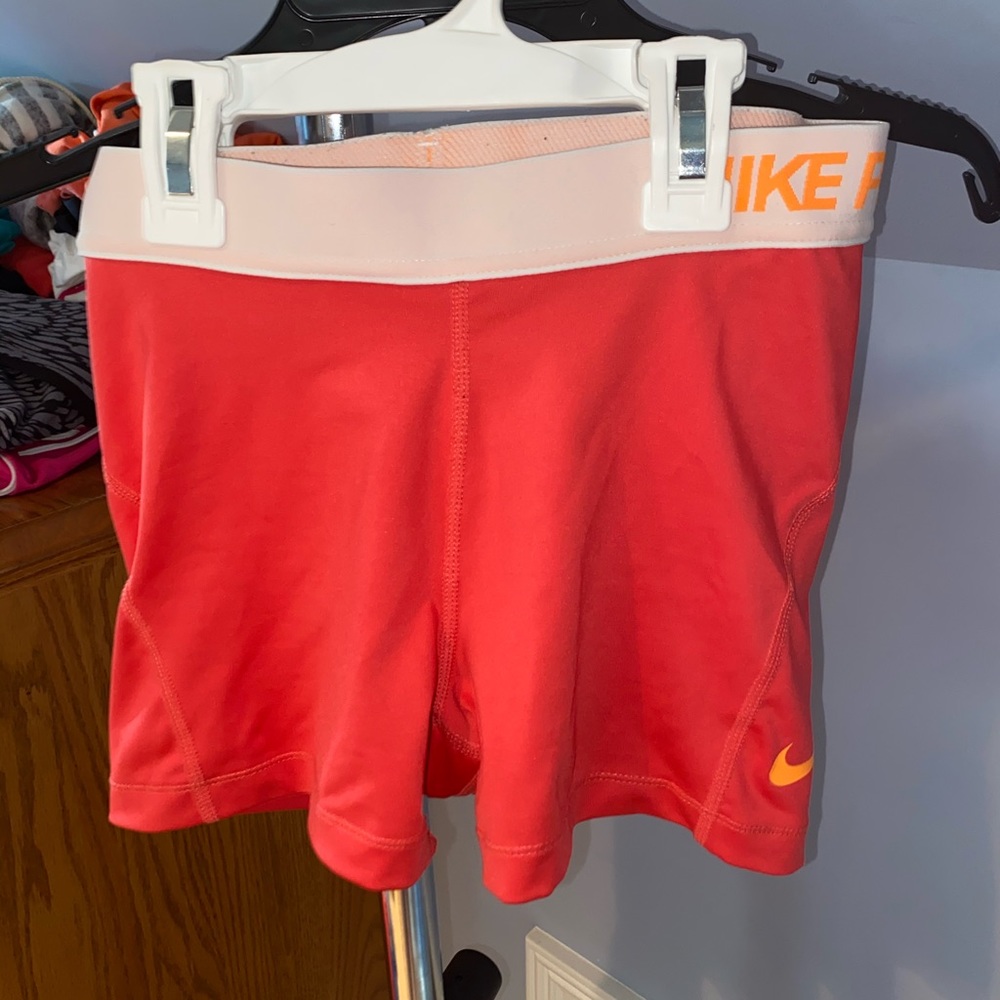 Barley worn coral nike pros